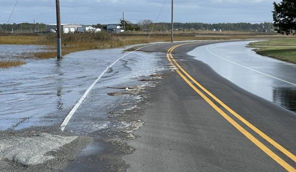 Photo of a street flooded with water. 